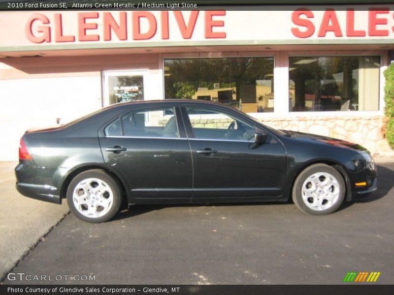 Atlantis Green Metallic / Medium Light Stone 2010 Ford Fusion SE