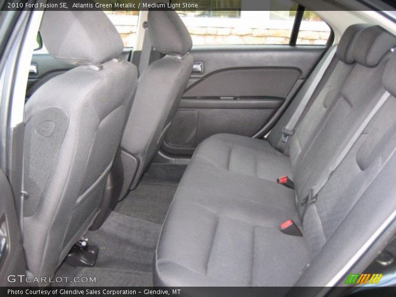 Atlantis Green Metallic / Medium Light Stone 2010 Ford Fusion SE