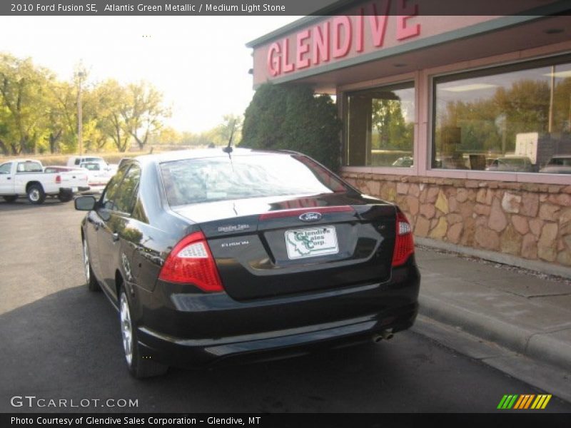 Atlantis Green Metallic / Medium Light Stone 2010 Ford Fusion SE