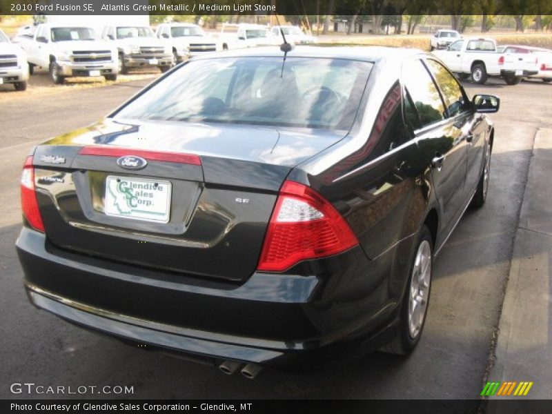Atlantis Green Metallic / Medium Light Stone 2010 Ford Fusion SE