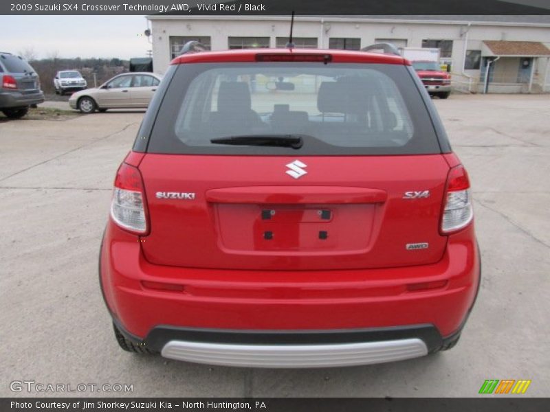 Vivid Red / Black 2009 Suzuki SX4 Crossover Technology AWD