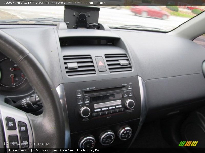 White Water Pearl / Black 2009 Suzuki SX4 Crossover Touring AWD