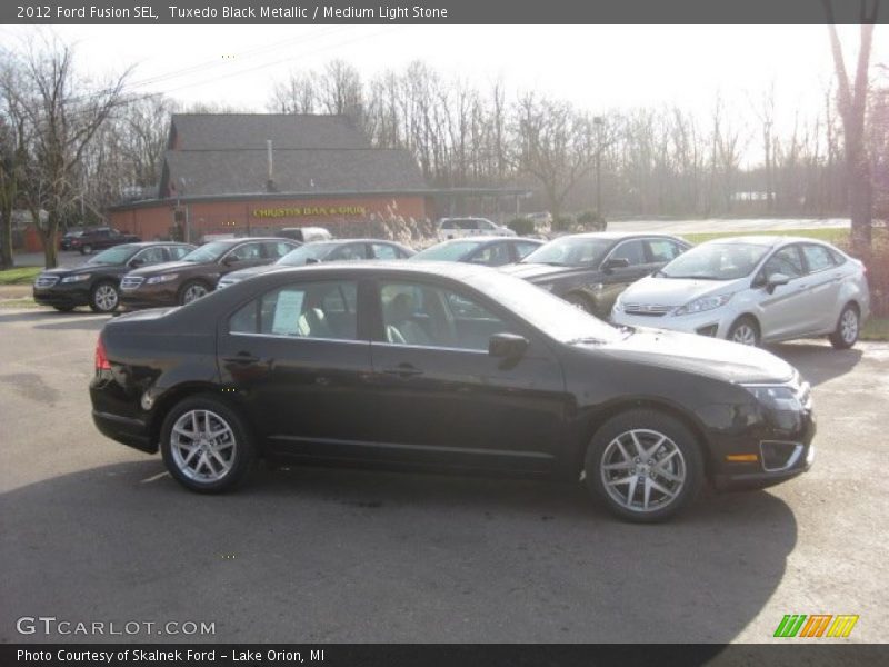 Tuxedo Black Metallic / Medium Light Stone 2012 Ford Fusion SEL