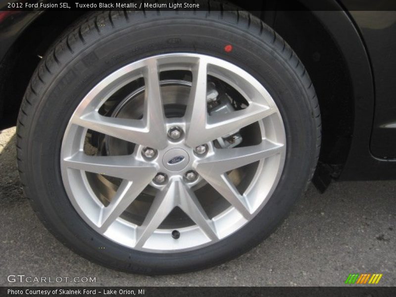 Tuxedo Black Metallic / Medium Light Stone 2012 Ford Fusion SEL