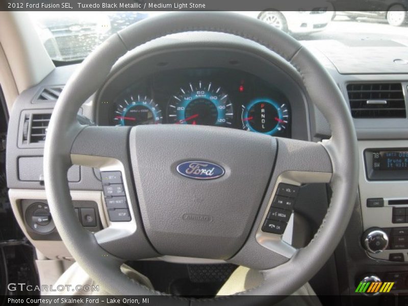 Tuxedo Black Metallic / Medium Light Stone 2012 Ford Fusion SEL