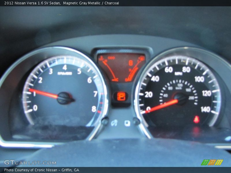 Magnetic Gray Metallic / Charcoal 2012 Nissan Versa 1.6 SV Sedan