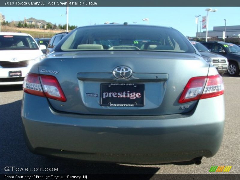 Aloe Green Metallic / Bisque 2010 Toyota Camry LE