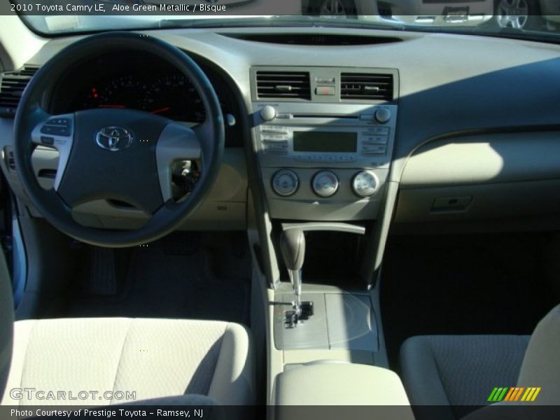 Aloe Green Metallic / Bisque 2010 Toyota Camry LE