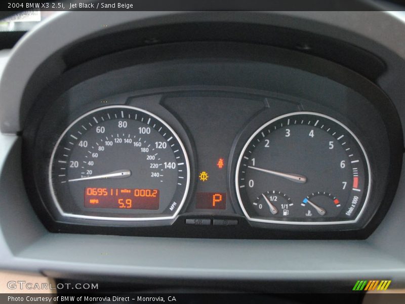 Jet Black / Sand Beige 2004 BMW X3 2.5i