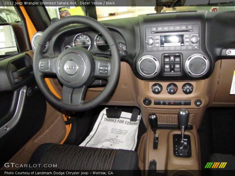 Dozer Yellow / Black 2012 Jeep Wrangler Unlimited Sahara 4x4