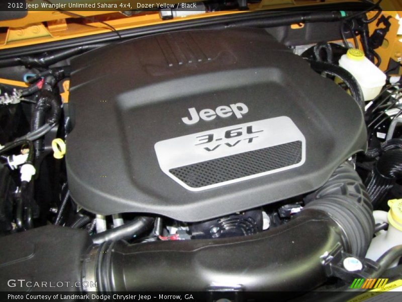 Dozer Yellow / Black 2012 Jeep Wrangler Unlimited Sahara 4x4