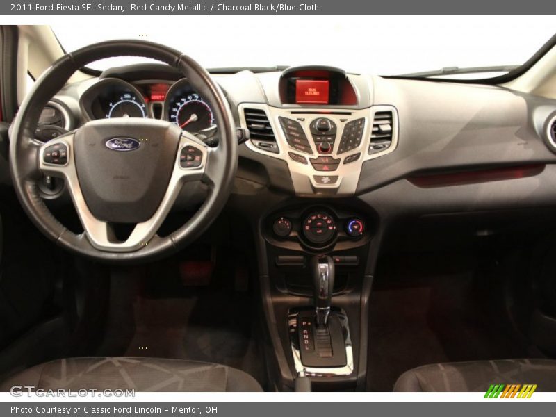 Red Candy Metallic / Charcoal Black/Blue Cloth 2011 Ford Fiesta SEL Sedan