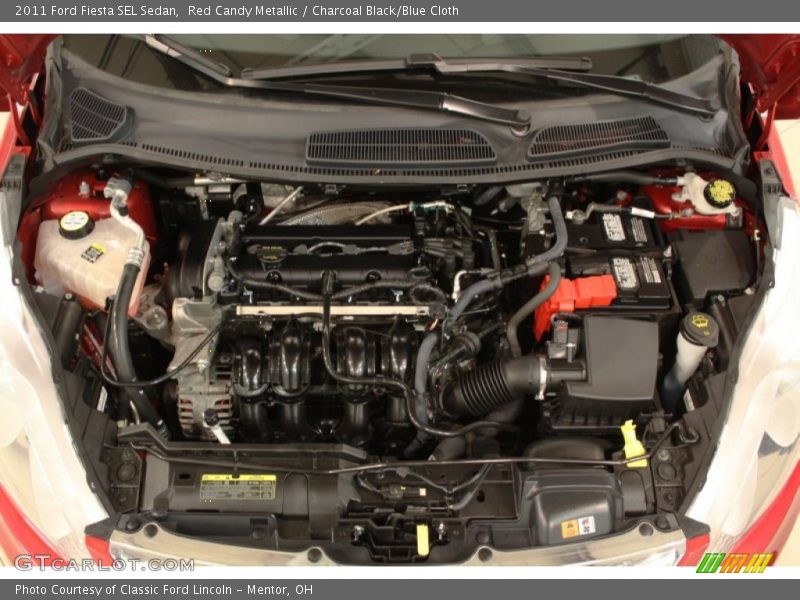 Red Candy Metallic / Charcoal Black/Blue Cloth 2011 Ford Fiesta SEL Sedan