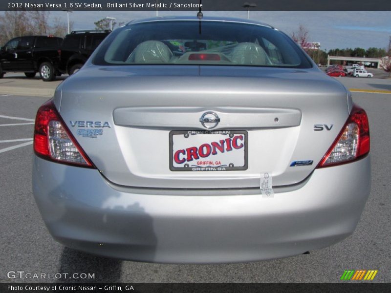 Brilliant Silver Metallic / Sandstone 2012 Nissan Versa 1.6 SV Sedan
