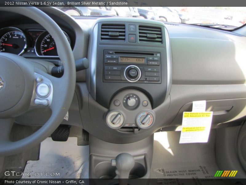 Brilliant Silver Metallic / Sandstone 2012 Nissan Versa 1.6 SV Sedan