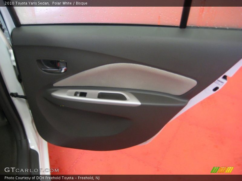Polar White / Bisque 2010 Toyota Yaris Sedan