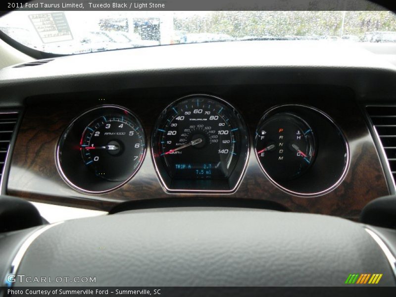 Tuxedo Black / Light Stone 2011 Ford Taurus Limited