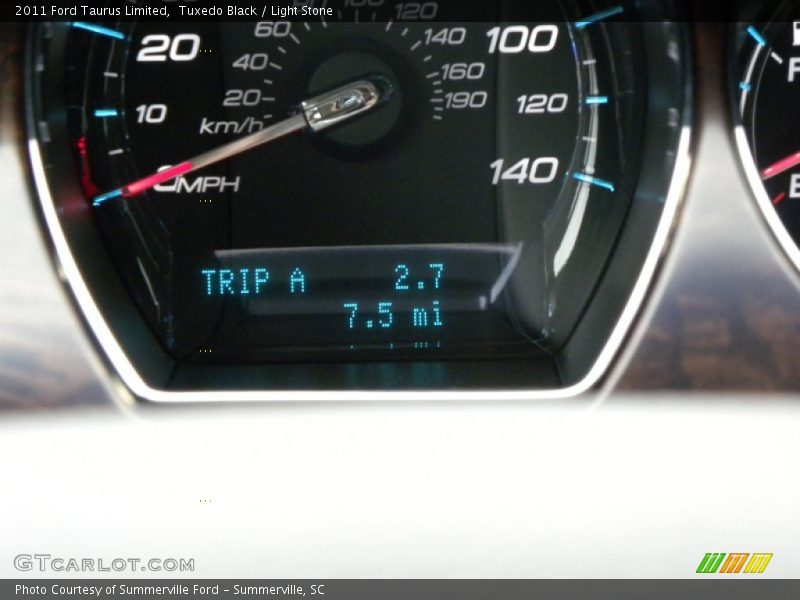 Tuxedo Black / Light Stone 2011 Ford Taurus Limited