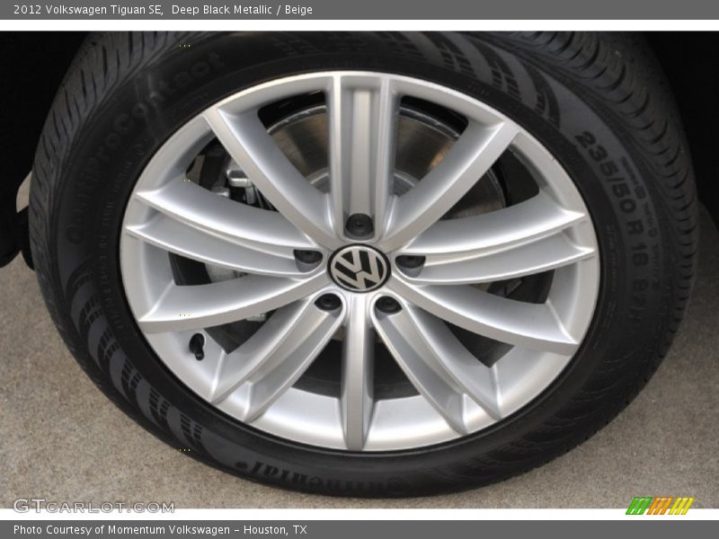 Deep Black Metallic / Beige 2012 Volkswagen Tiguan SE