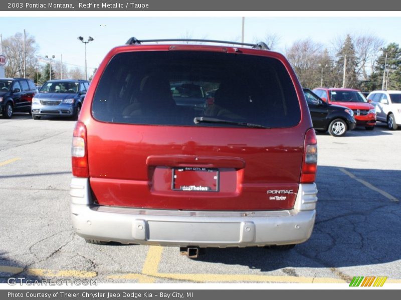 Redfire Metallic / Taupe 2003 Pontiac Montana