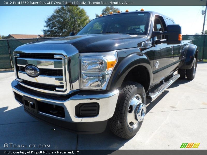 Front 3/4 View of 2012 F350 Super Duty XLT Crew Cab 4x4 Dually