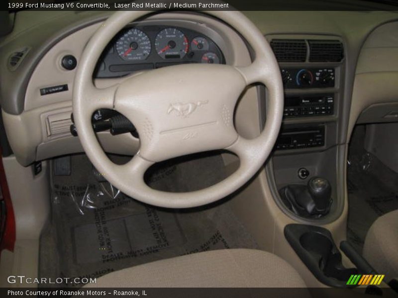 Laser Red Metallic / Medium Parchment 1999 Ford Mustang V6 Convertible