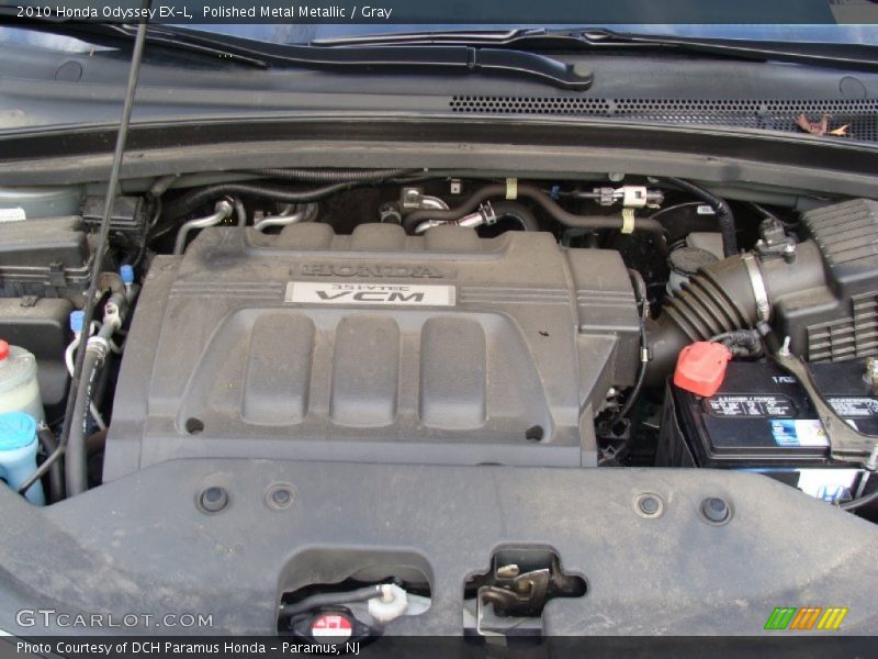 Polished Metal Metallic / Gray 2010 Honda Odyssey EX-L