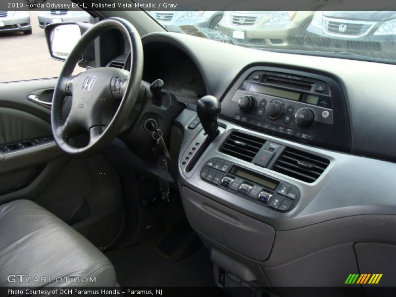 Polished Metal Metallic / Gray 2010 Honda Odyssey EX-L
