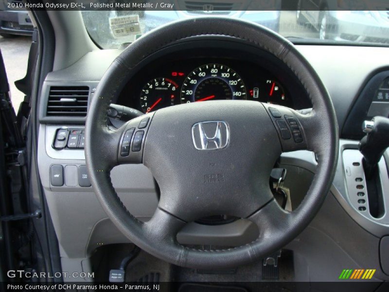 Polished Metal Metallic / Gray 2010 Honda Odyssey EX-L