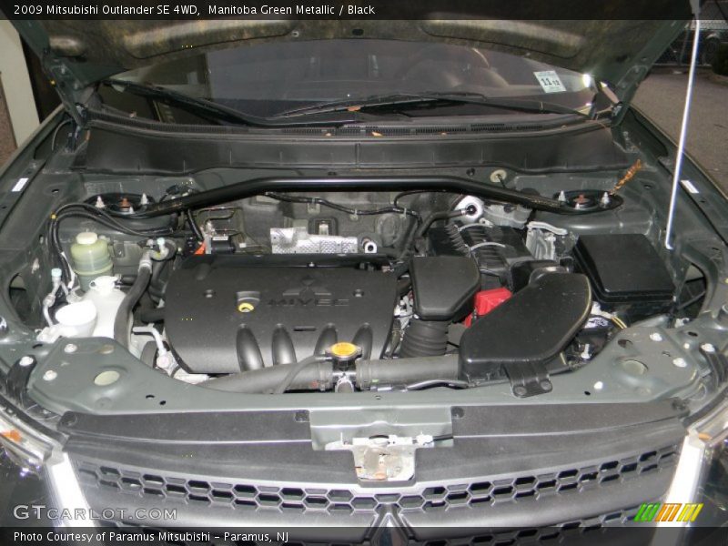 Manitoba Green Metallic / Black 2009 Mitsubishi Outlander SE 4WD