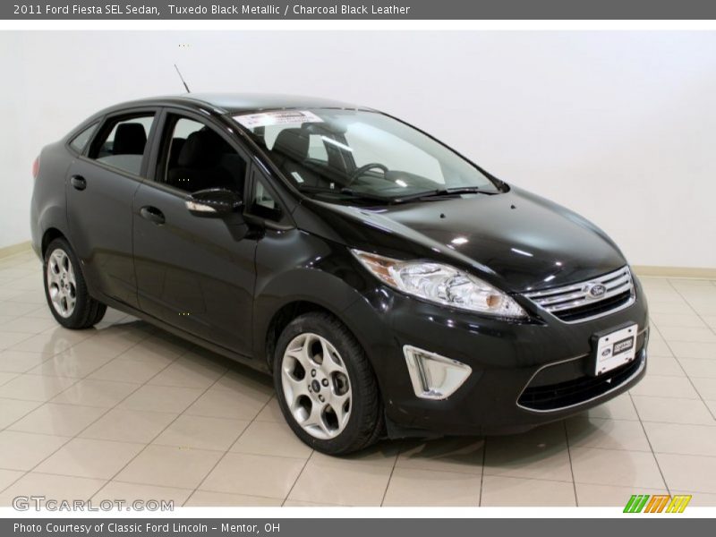 Tuxedo Black Metallic / Charcoal Black Leather 2011 Ford Fiesta SEL Sedan