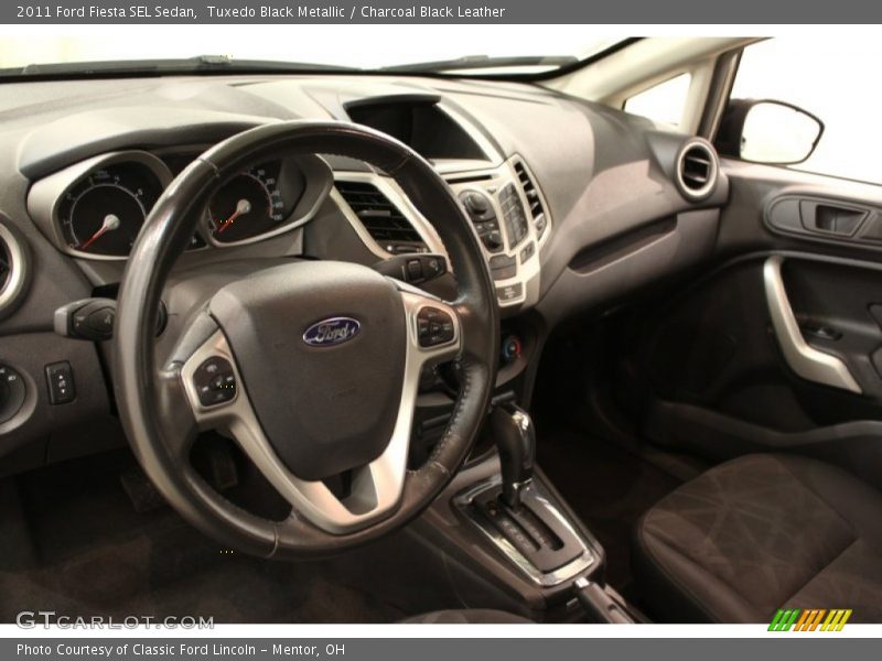Tuxedo Black Metallic / Charcoal Black Leather 2011 Ford Fiesta SEL Sedan