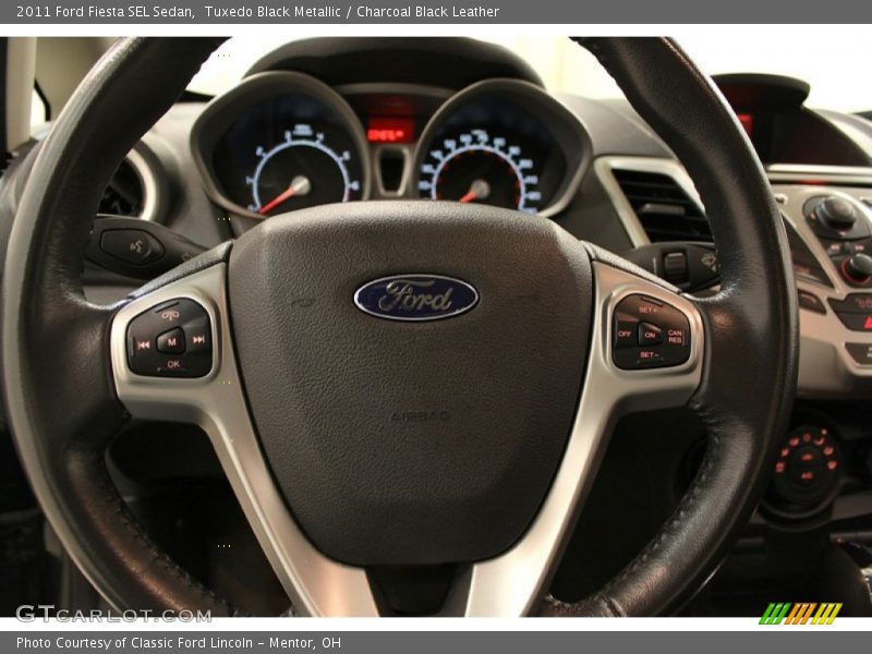Tuxedo Black Metallic / Charcoal Black Leather 2011 Ford Fiesta SEL Sedan