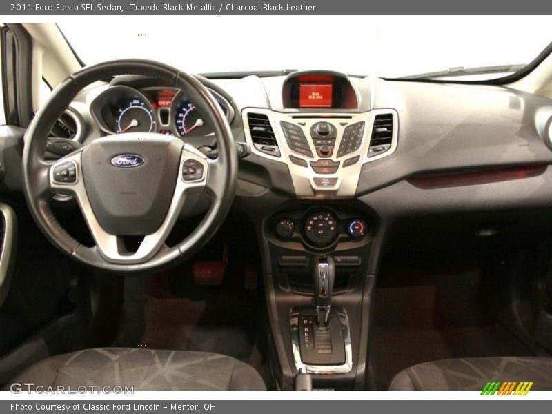 Tuxedo Black Metallic / Charcoal Black Leather 2011 Ford Fiesta SEL Sedan