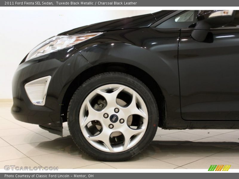 Tuxedo Black Metallic / Charcoal Black Leather 2011 Ford Fiesta SEL Sedan