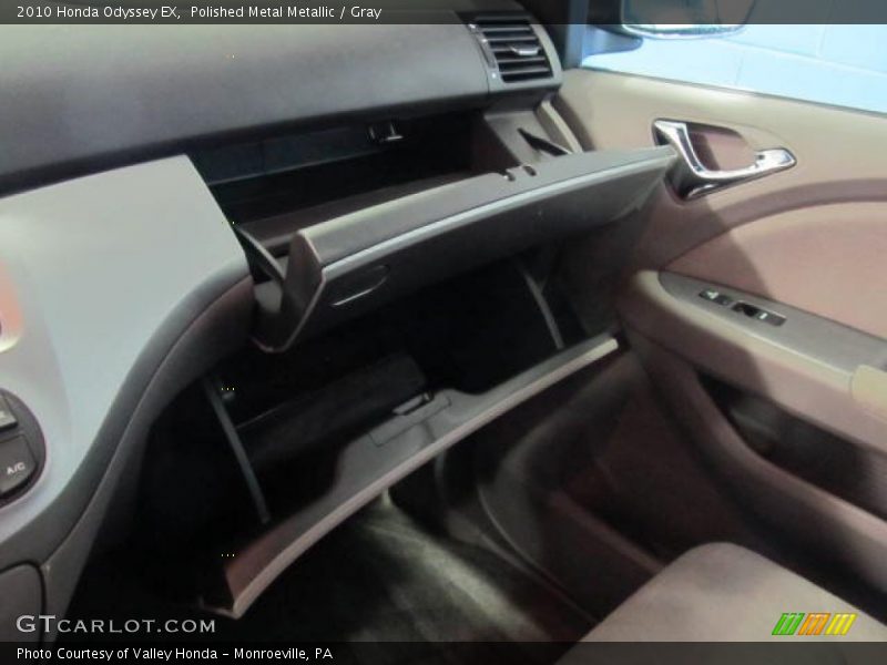 Polished Metal Metallic / Gray 2010 Honda Odyssey EX