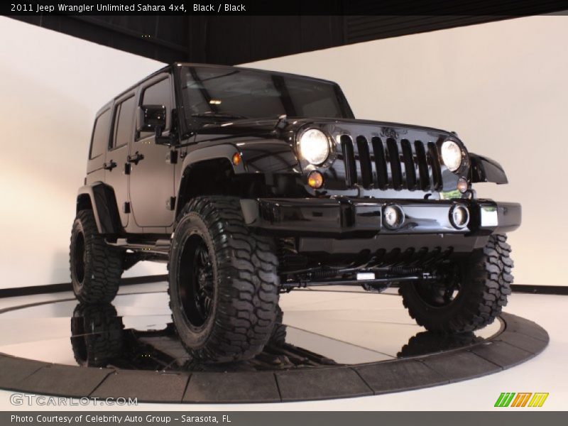 Front 3/4 View of 2011 Wrangler Unlimited Sahara 4x4