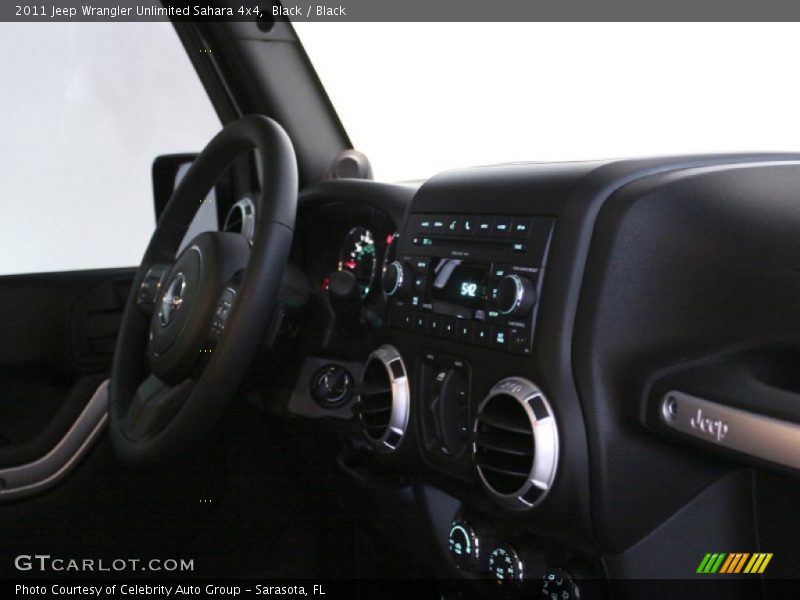 Black / Black 2011 Jeep Wrangler Unlimited Sahara 4x4