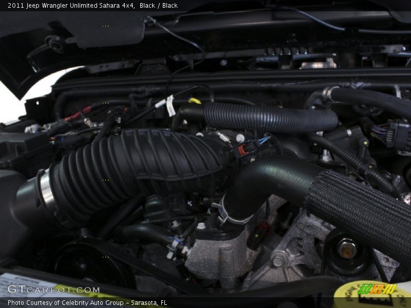 Black / Black 2011 Jeep Wrangler Unlimited Sahara 4x4