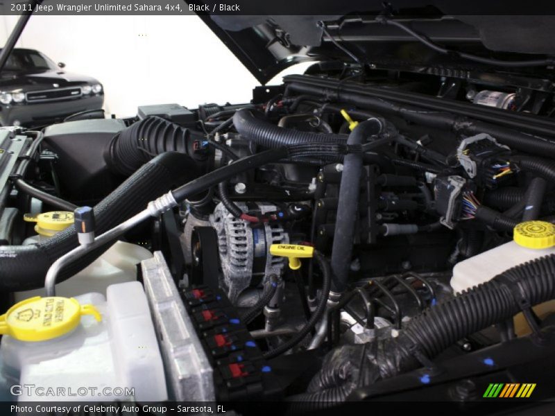Black / Black 2011 Jeep Wrangler Unlimited Sahara 4x4
