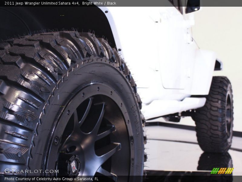 Bright White / Black 2011 Jeep Wrangler Unlimited Sahara 4x4