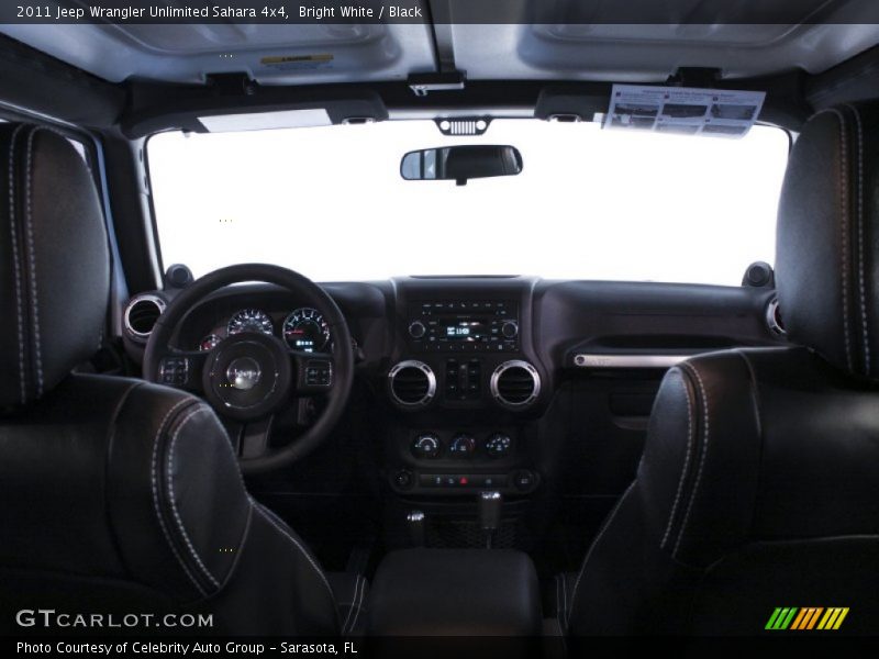 Bright White / Black 2011 Jeep Wrangler Unlimited Sahara 4x4