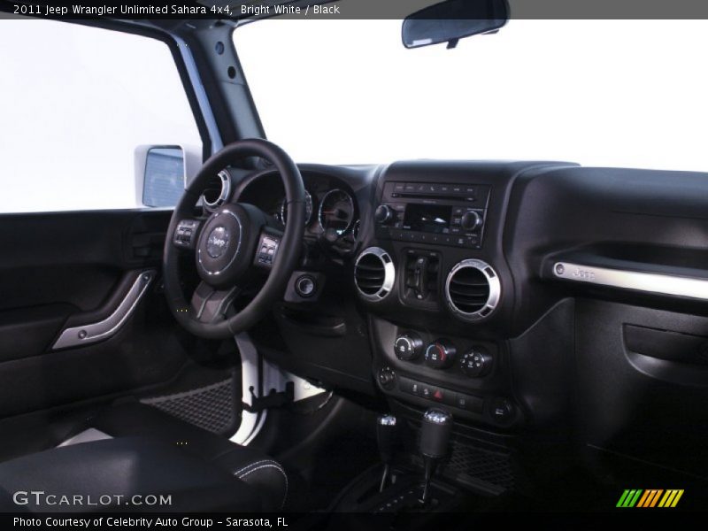 Bright White / Black 2011 Jeep Wrangler Unlimited Sahara 4x4