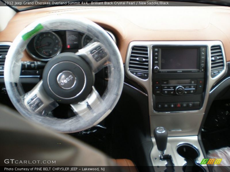 Brilliant Black Crystal Pearl / New Saddle/Black 2012 Jeep Grand Cherokee Overland Summit 4x4