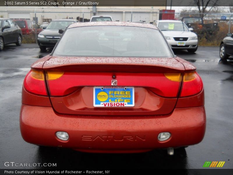 Orange / Gray/Ebony 2002 Saturn S Series SC2 Coupe