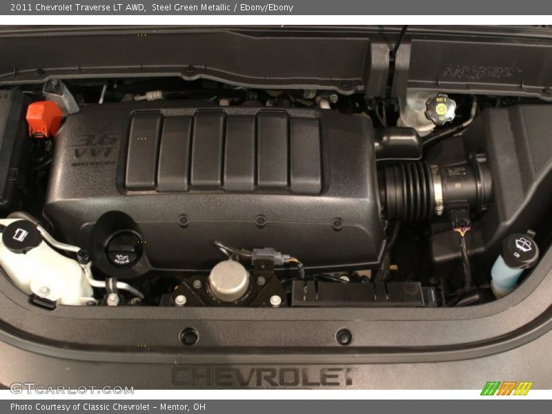 Steel Green Metallic / Ebony/Ebony 2011 Chevrolet Traverse LT AWD