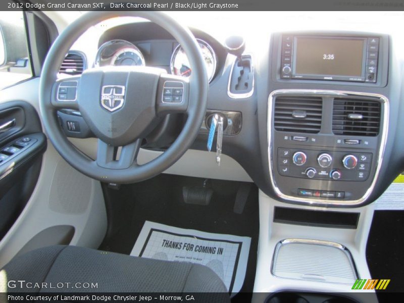 Dark Charcoal Pearl / Black/Light Graystone 2012 Dodge Grand Caravan SXT