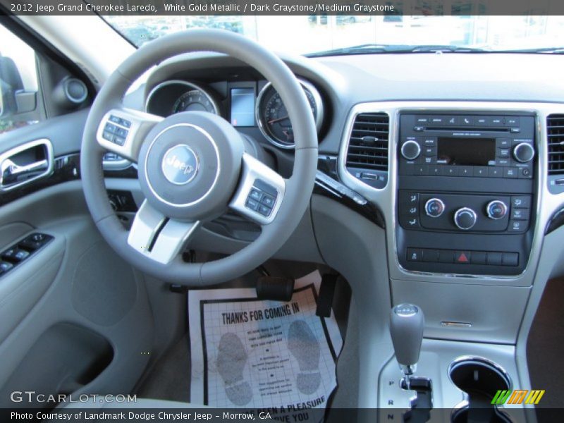 White Gold Metallic / Dark Graystone/Medium Graystone 2012 Jeep Grand Cherokee Laredo