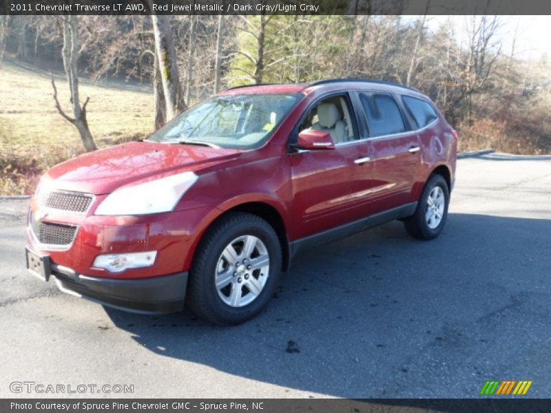 Red Jewel Metallic / Dark Gray/Light Gray 2011 Chevrolet Traverse LT AWD