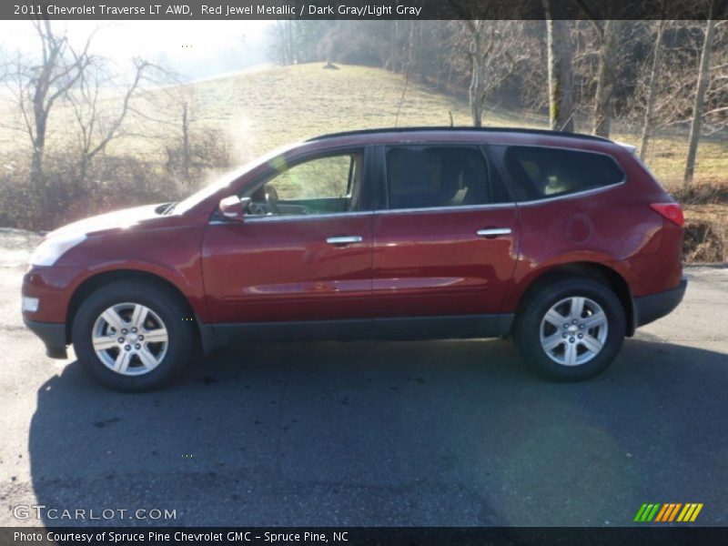 Red Jewel Metallic / Dark Gray/Light Gray 2011 Chevrolet Traverse LT AWD